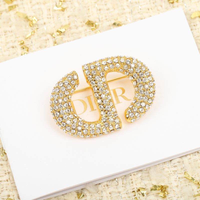 ch**an D*or brooches